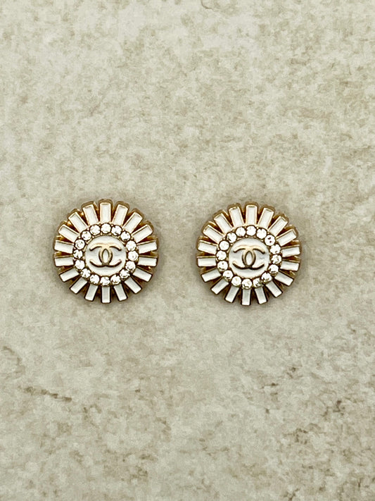 White starburst stud earrings